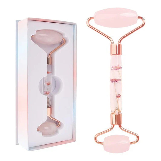 Renlys – Massasjerulle for Ansikt og Kropp med rosa blader og ergonomisk design.
